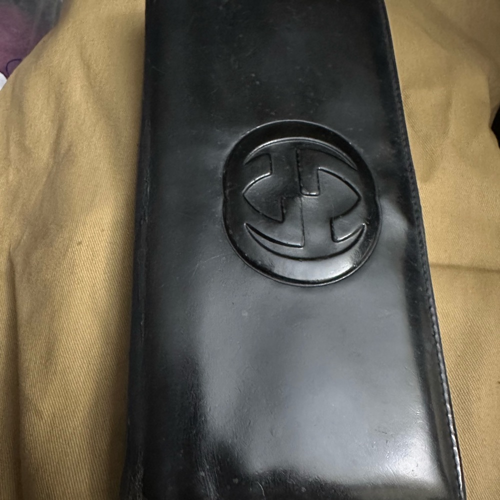 Gucci Shiny Black Leather Embossed Detail
